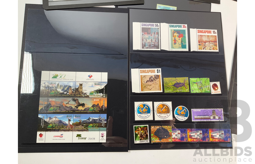Collection of International Mint and Cancelled Stamps Including Austria, Japan, China, Singapore, Tuvalu, Indonesia, Chile