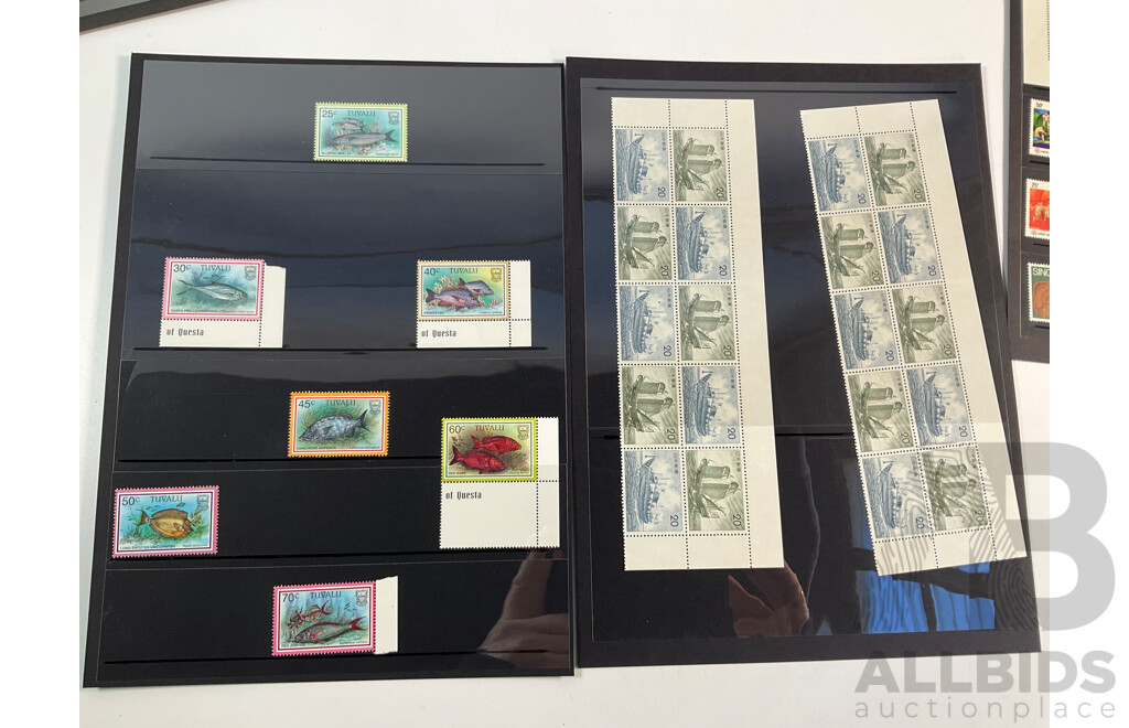 Collection of International Mint and Cancelled Stamps Including Austria, Japan, China, Singapore, Tuvalu, Indonesia, Chile
