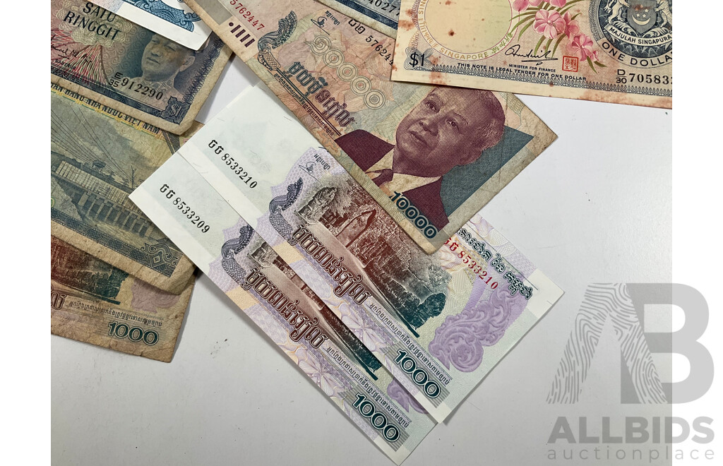 Collection of Vintage International Banknotes Including Two Cambodia Consecutive One Thousand Riel, Taiwan, Singapore, Hong Kong, Vietnam, Malaysia