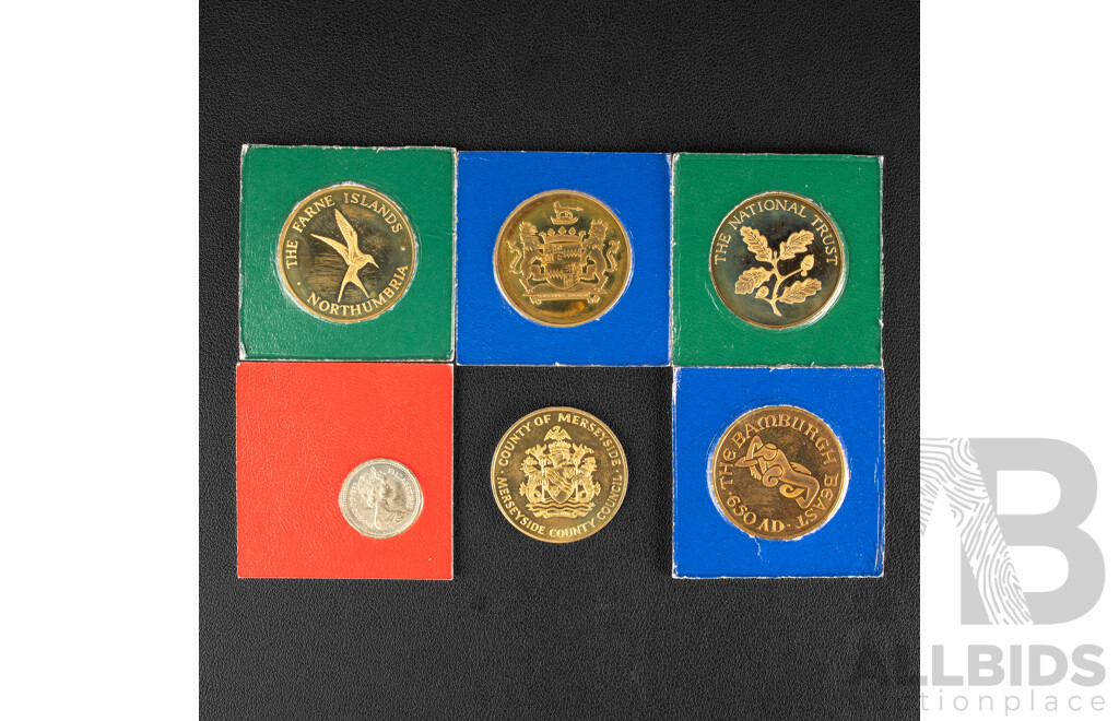 United Kingdom 1983 UNC One Pound Coin, First Year Issue, Solid Bronze Medallions Including Bamburgh Castle, Alnwick Castle, Lindisfarne Castle, Farne Islands, County of Merseyside