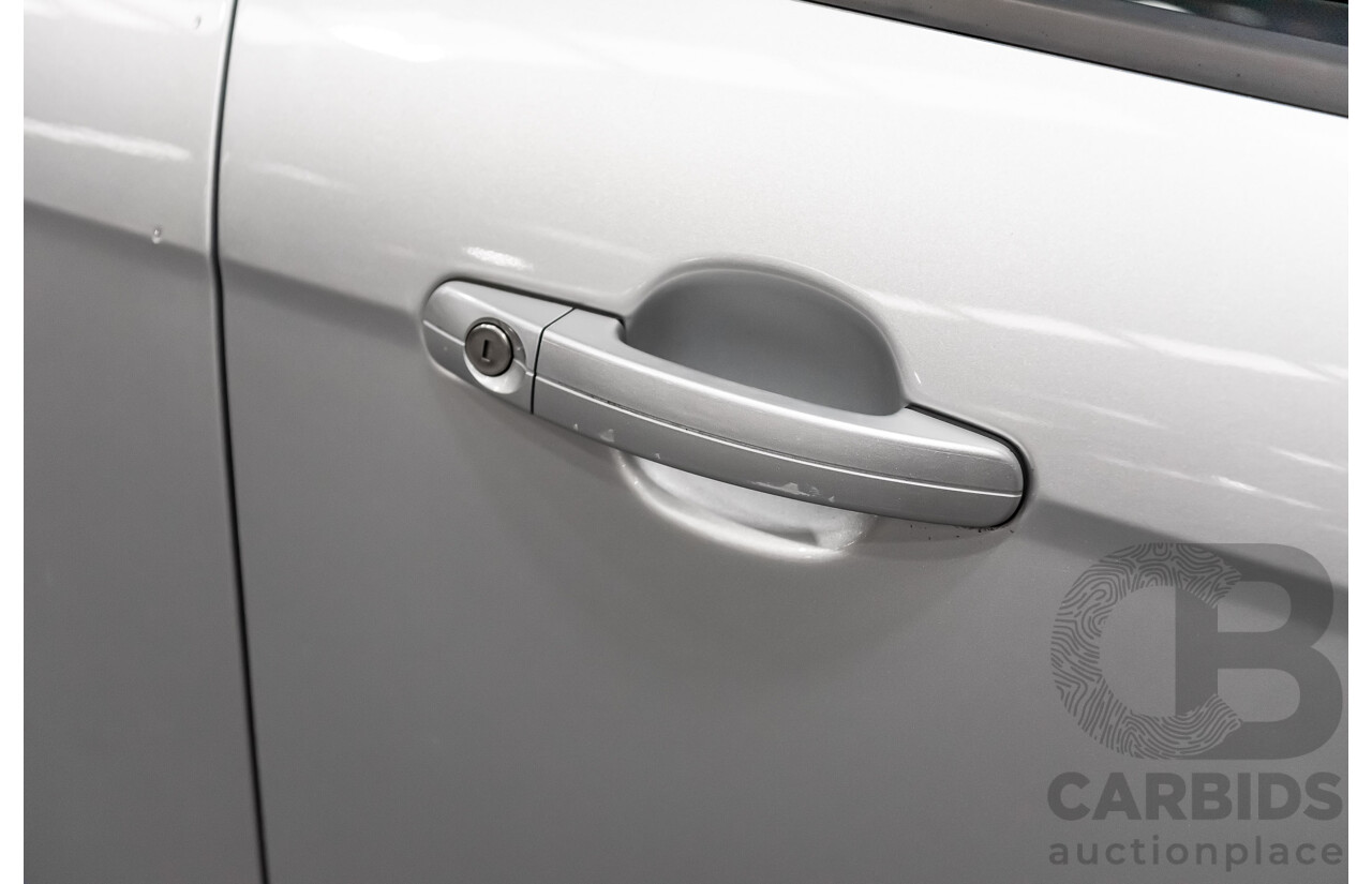 7/2013 Ford Focus Ambiente LW MK2 4d Sedan Metallic Ingot Silver 1.6L