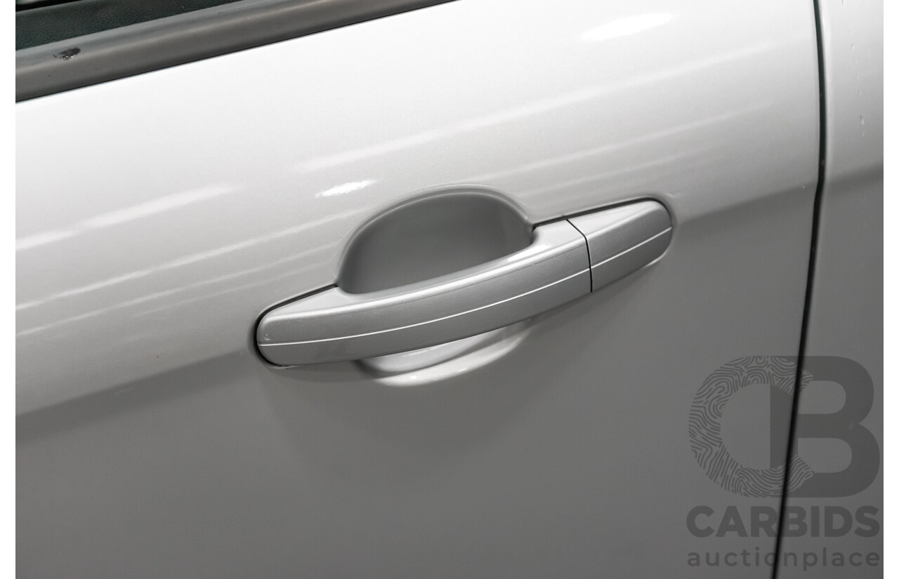 7/2013 Ford Focus Ambiente LW MK2 4d Sedan Metallic Ingot Silver 1.6L