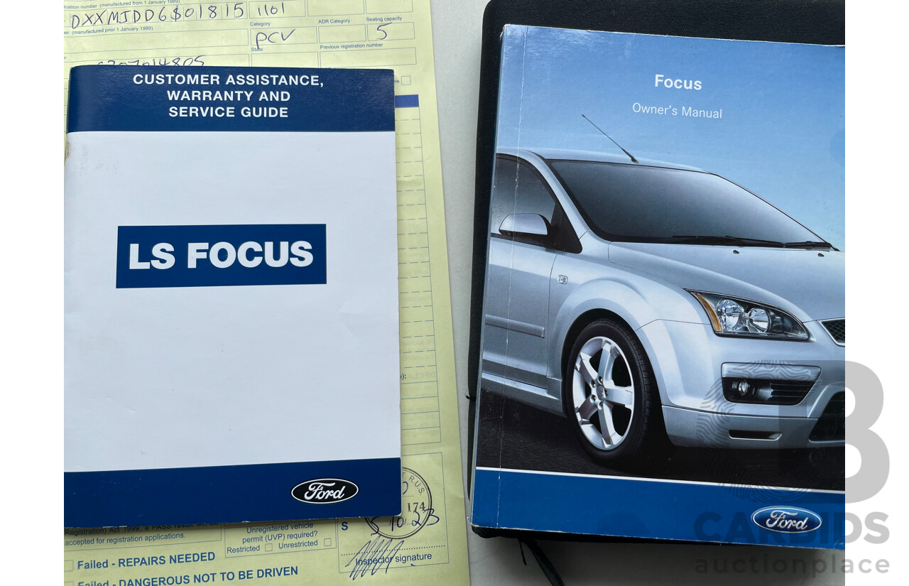 4/2006 Ford Focus LX LS 5d Hatchback White 2.0L