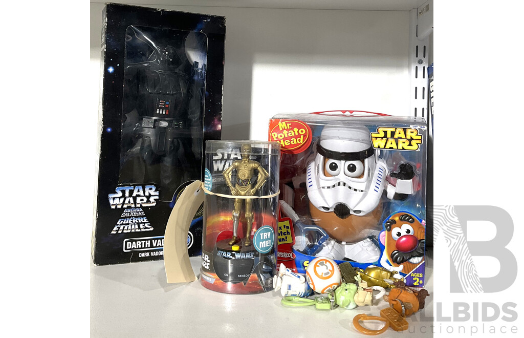 Three Collectable Star Wars Figurines