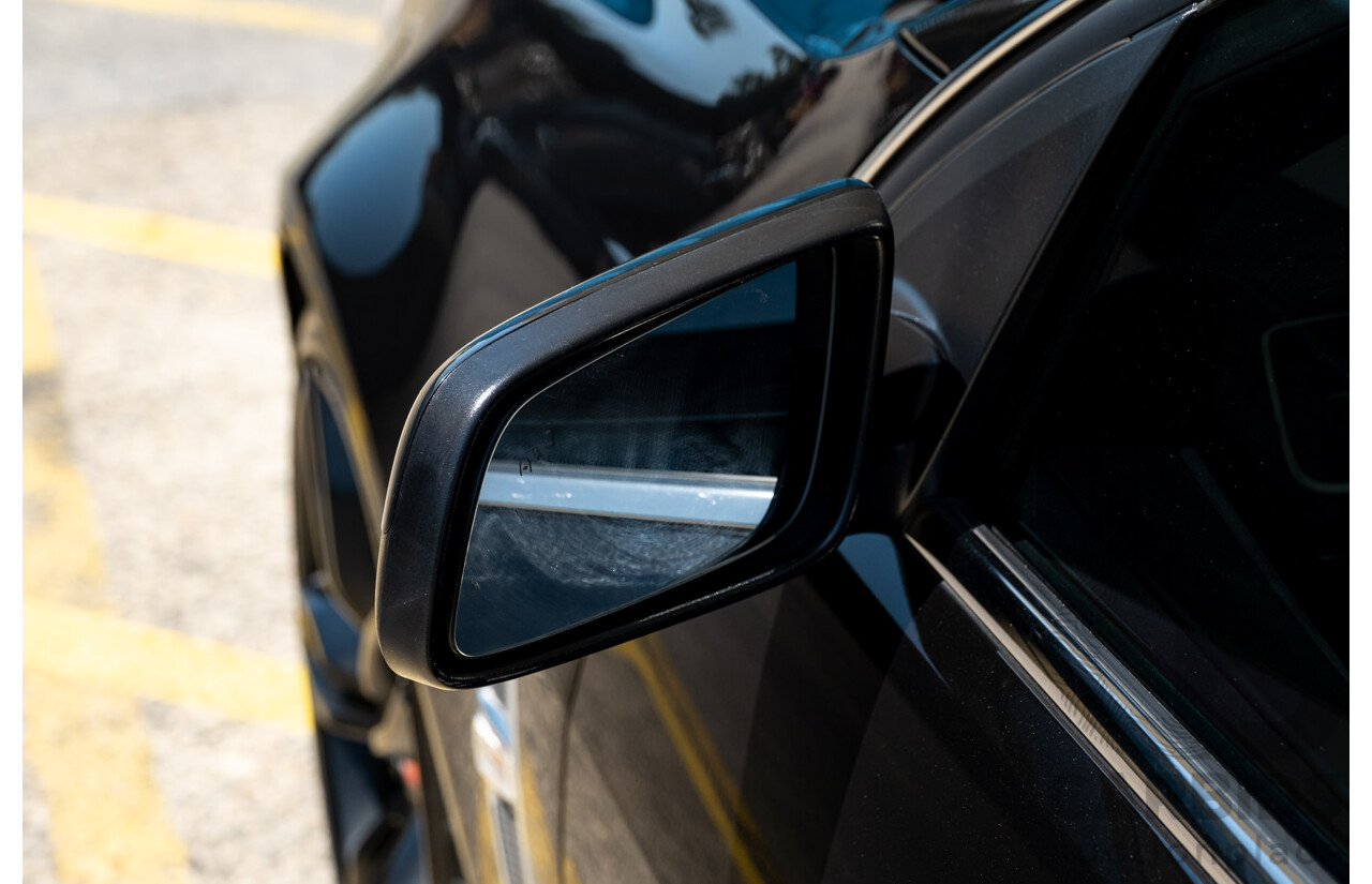 2/2016 Holden Commodore SS-V Redline VF2 4d Sedan Black Supercharged V8 6.2L - Modified