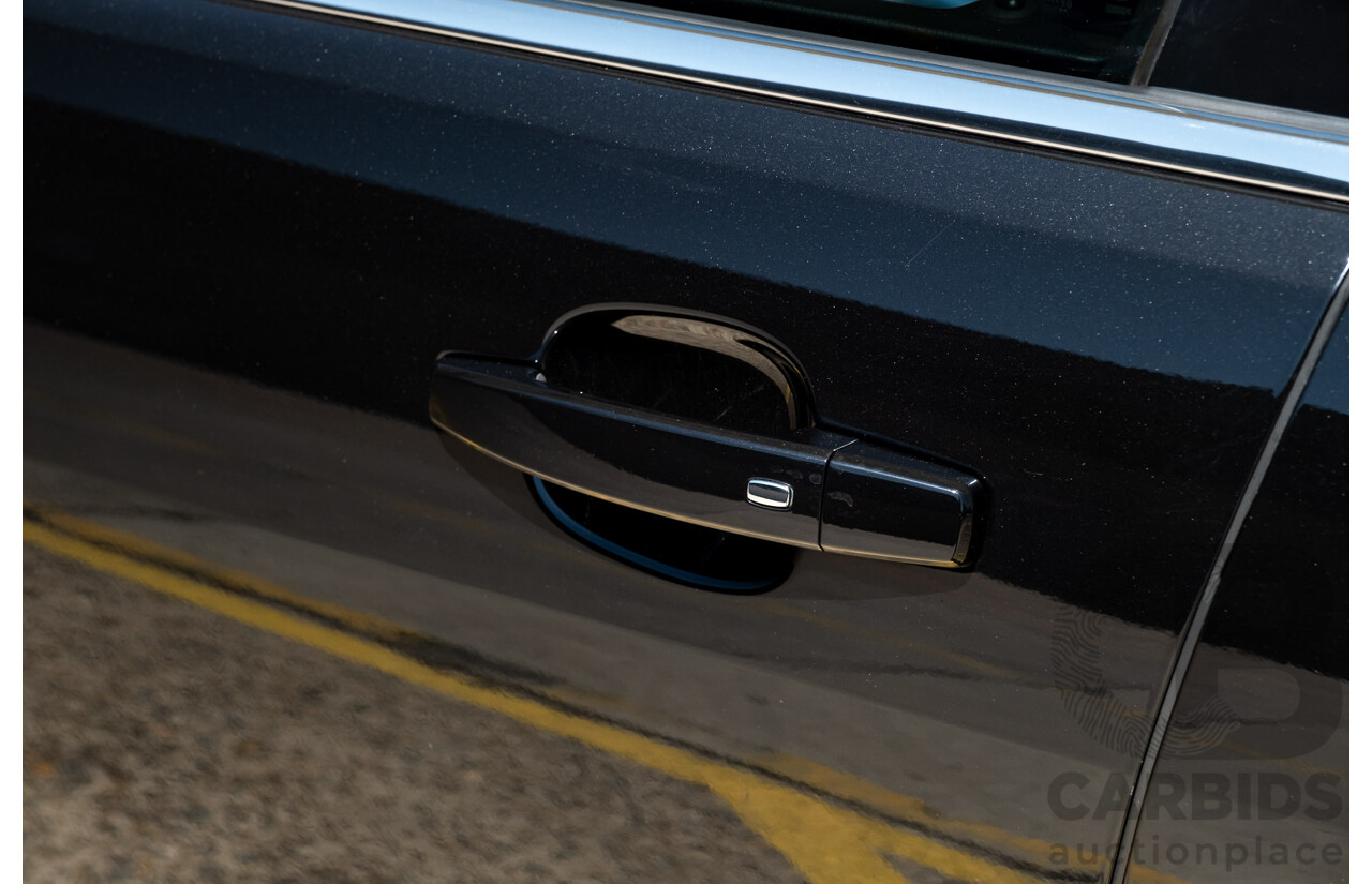 2/2016 Holden Commodore SS-V Redline VF2 4d Sedan Black Supercharged V8 6.2L - Modified