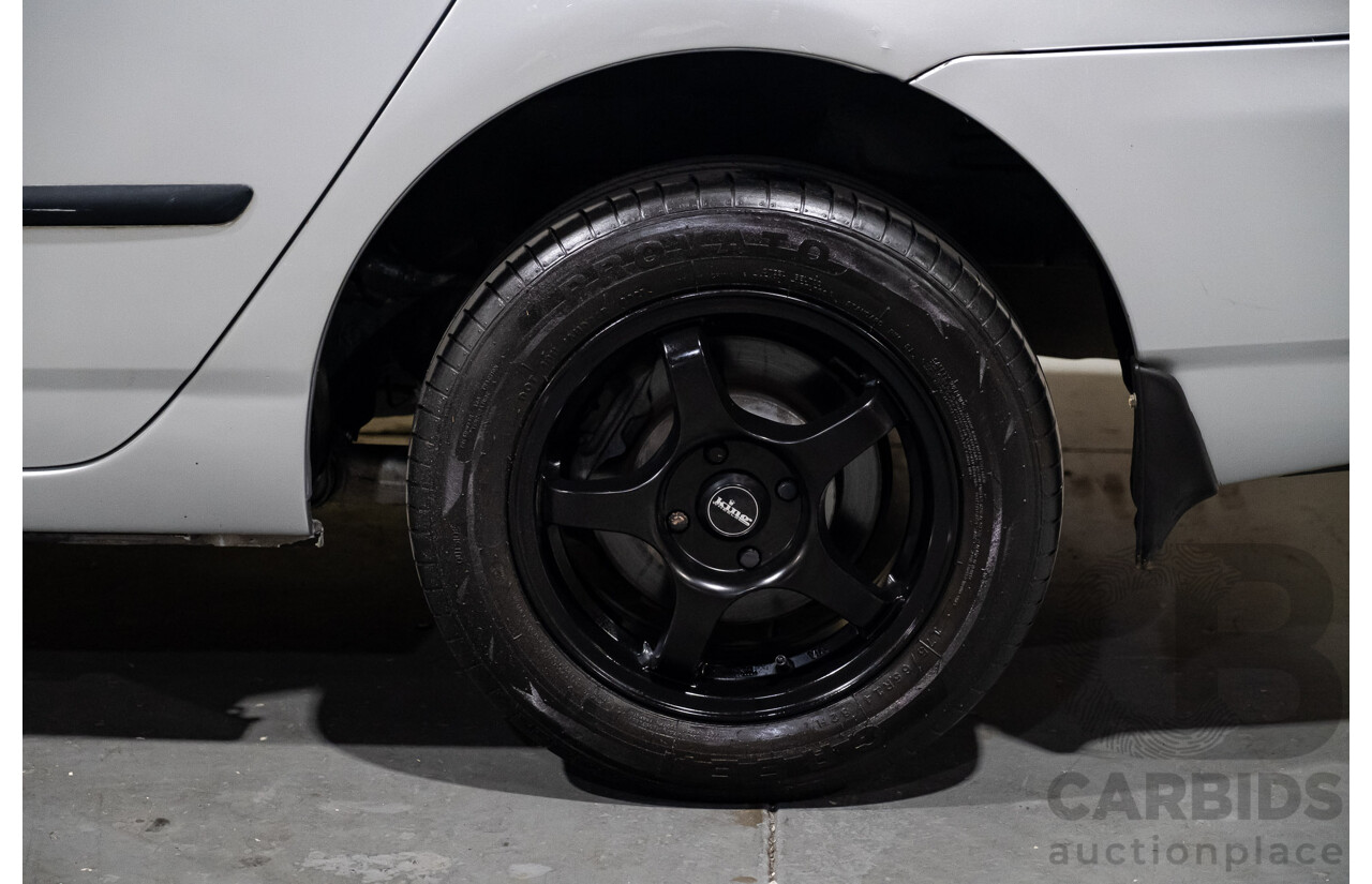 5/2002 Toyota Corolla Ascent ZZE122R 4d Sedan Silver 1.8L