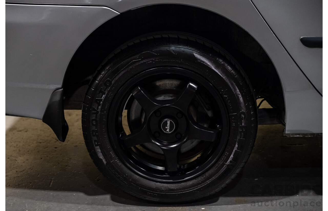 5/2002 Toyota Corolla Ascent ZZE122R 4d Sedan Silver 1.8L