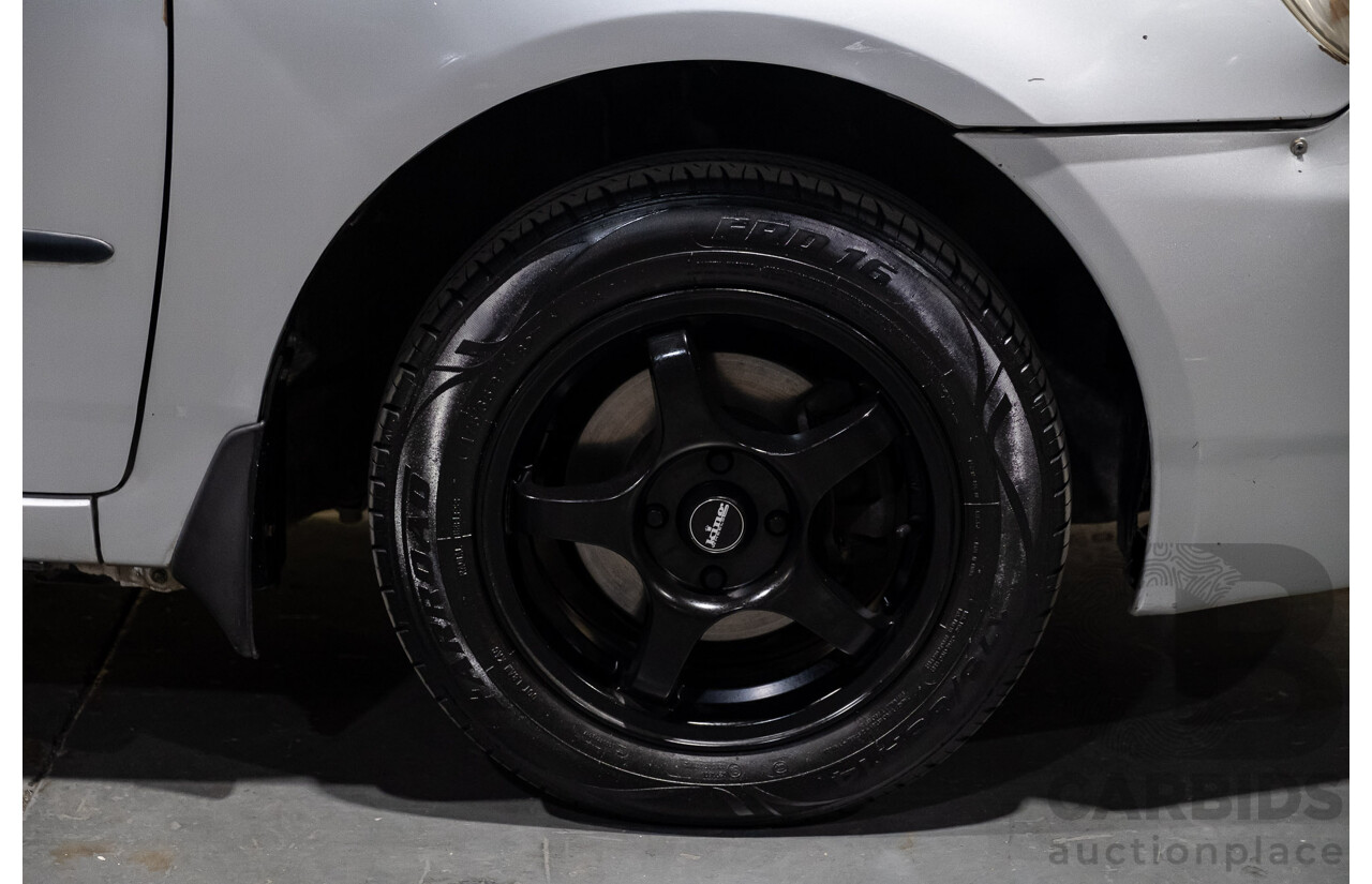 5/2002 Toyota Corolla Ascent ZZE122R 4d Sedan Silver 1.8L