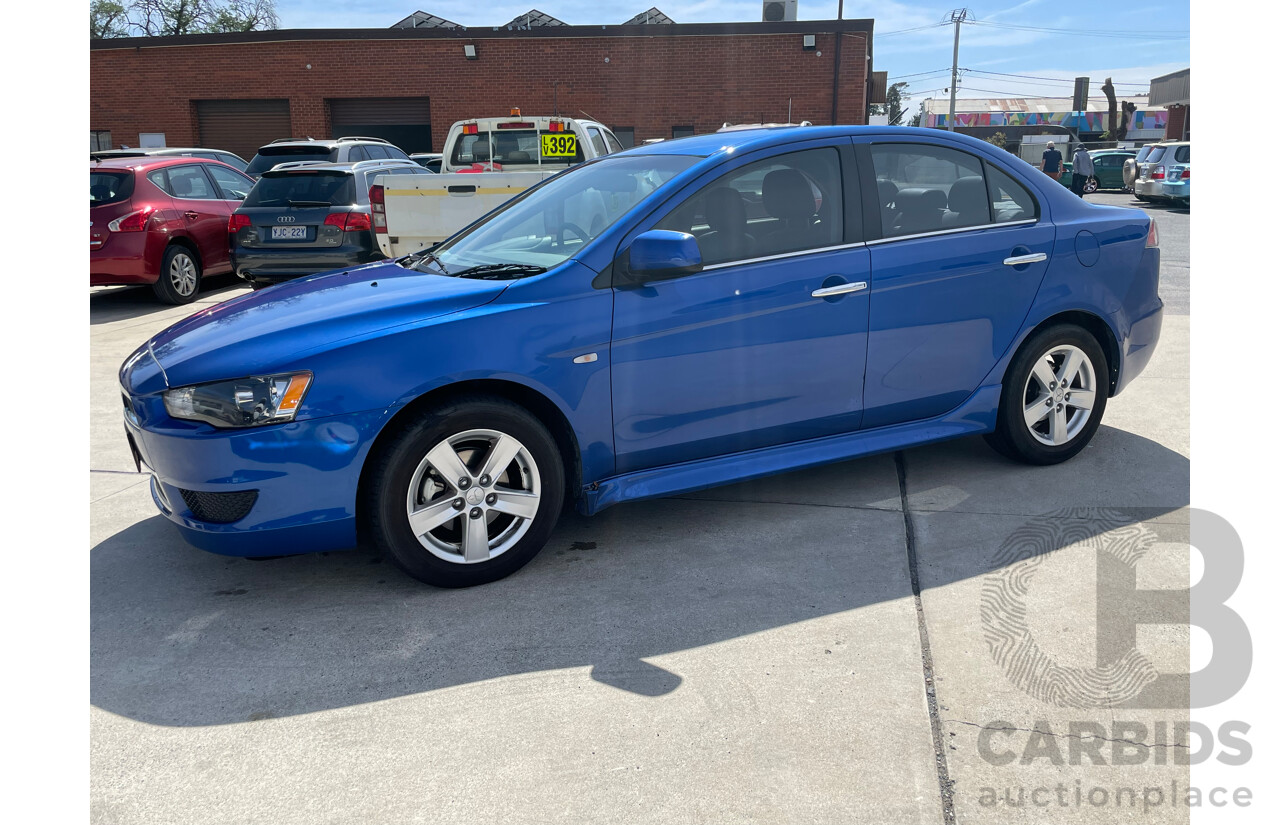 12/2013 Mitsubishi Lancer LX CJ MY13 4d Sedan Blue 2.0L
