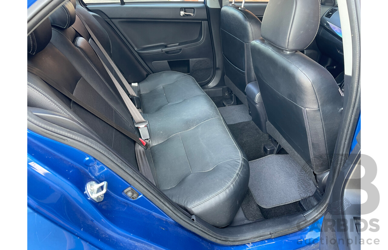 12/2013 Mitsubishi Lancer LX CJ MY13 4d Sedan Blue 2.0L