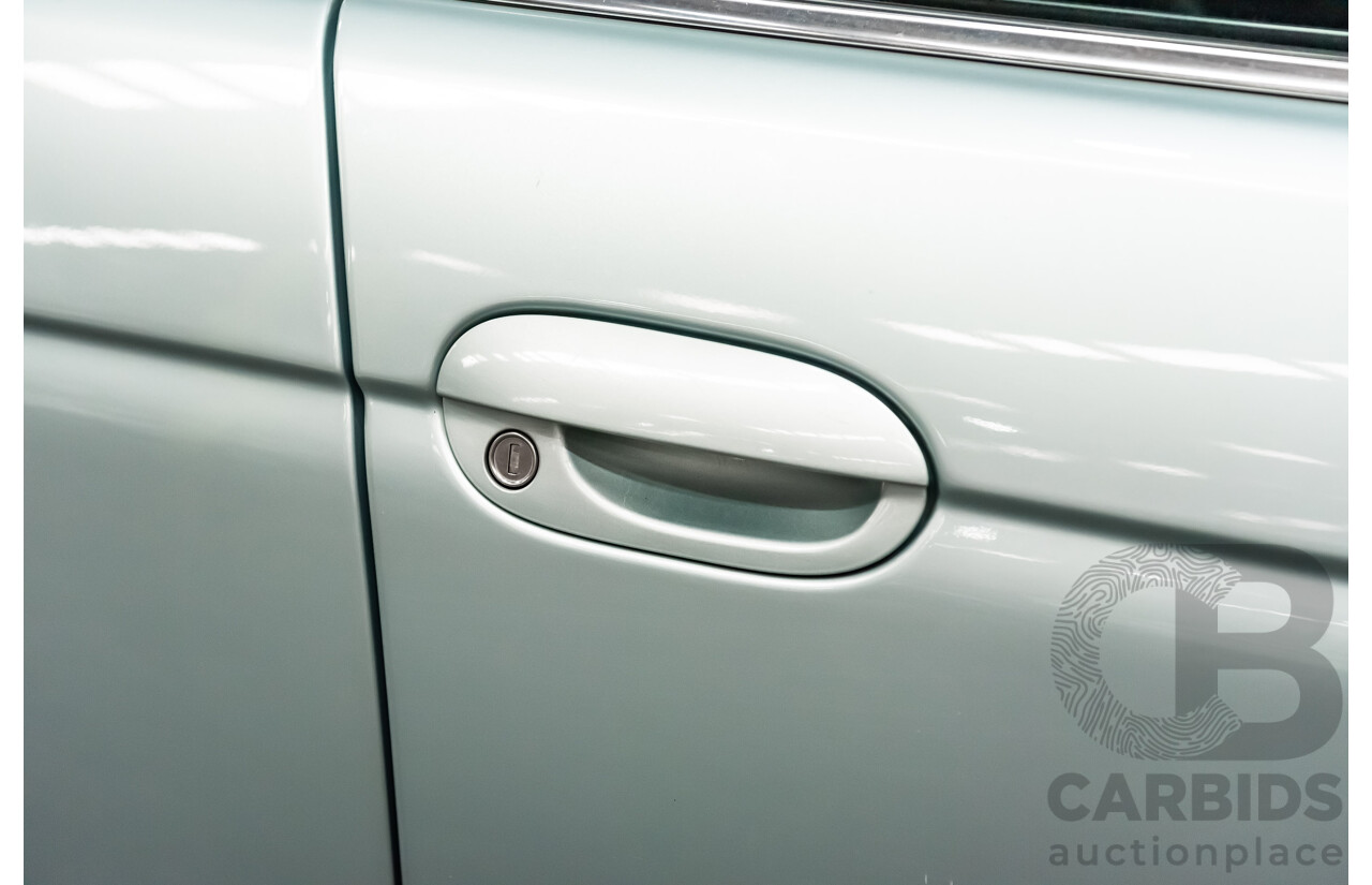 7/1999 BMW 528i E39 4d Sedan Glacier Green 2.8L