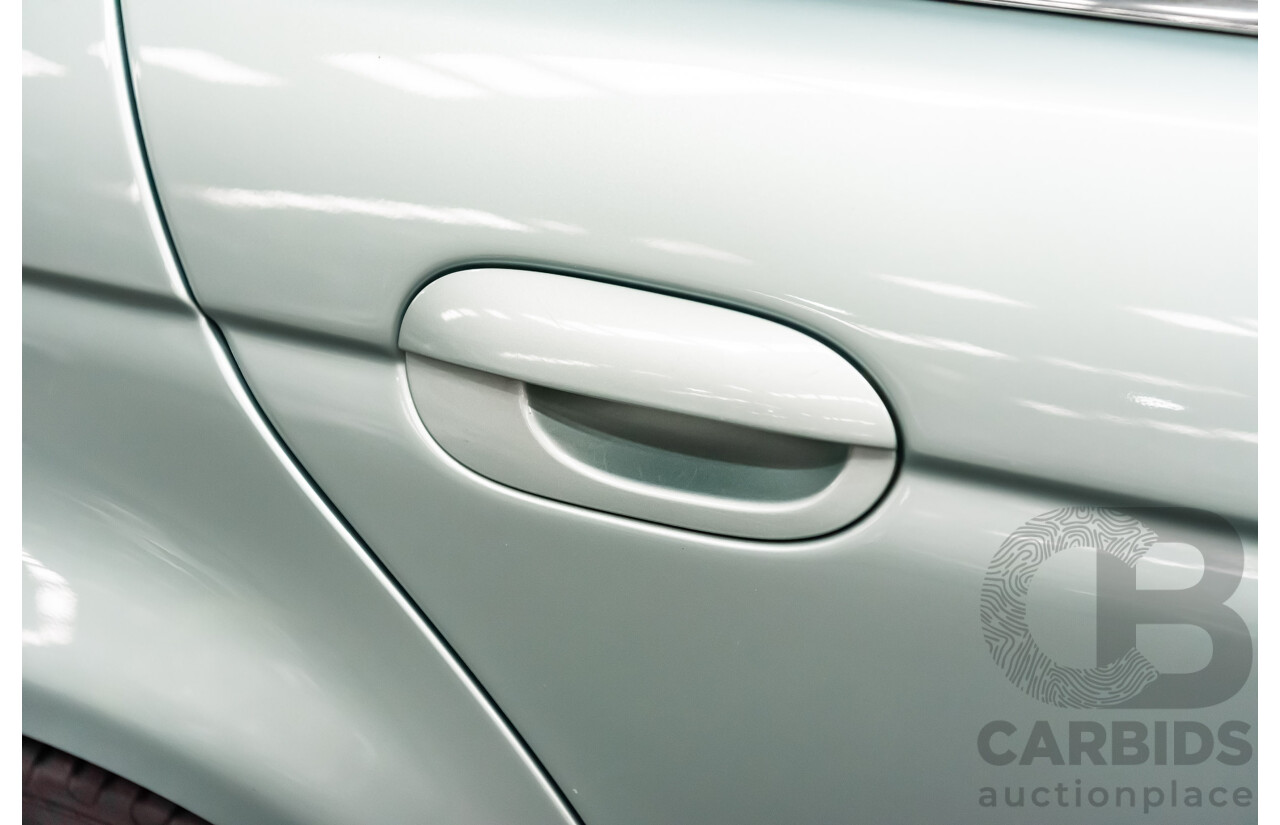 7/1999 BMW 528i E39 4d Sedan Glacier Green 2.8L