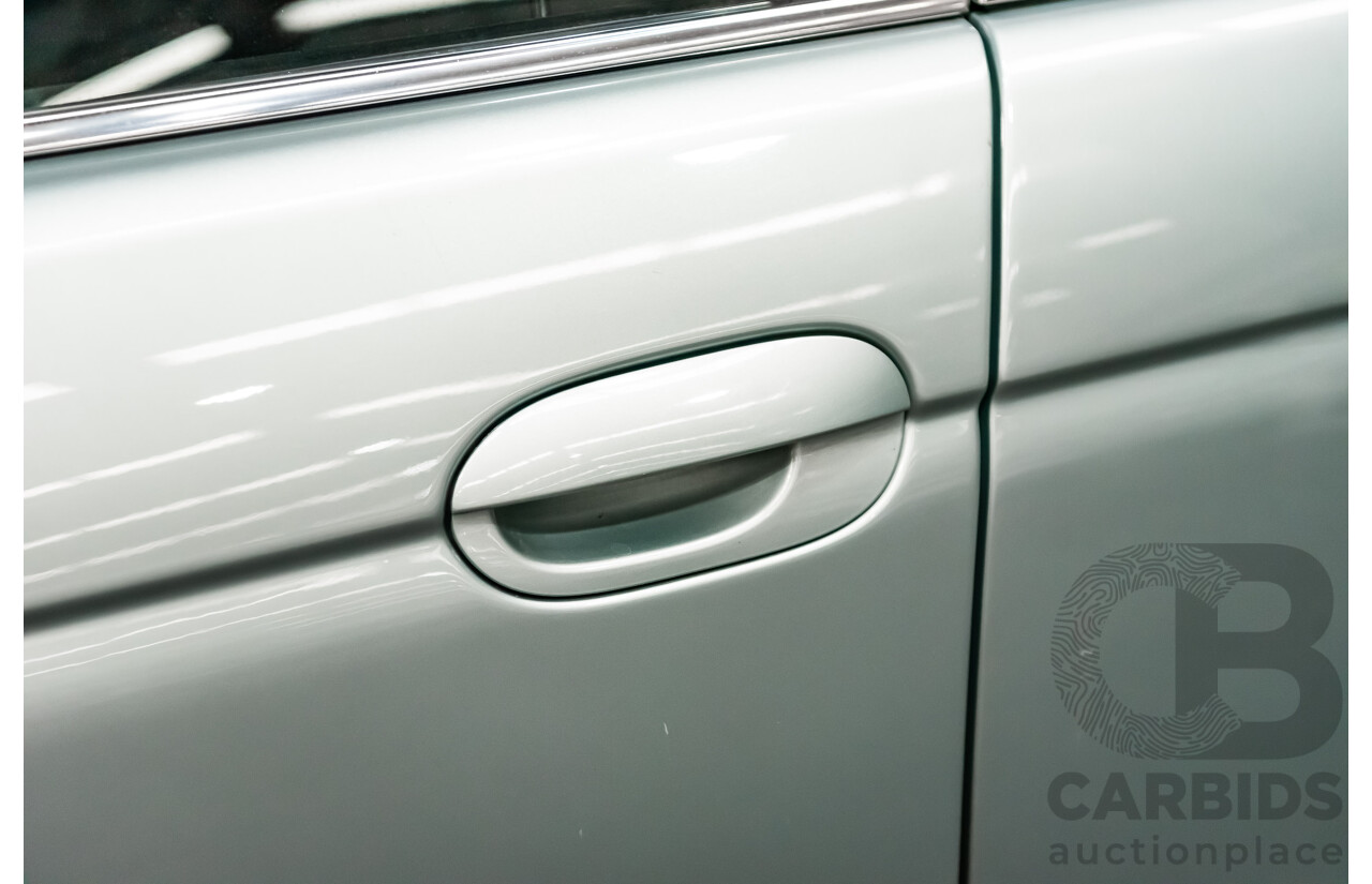 7/1999 BMW 528i E39 4d Sedan Glacier Green 2.8L