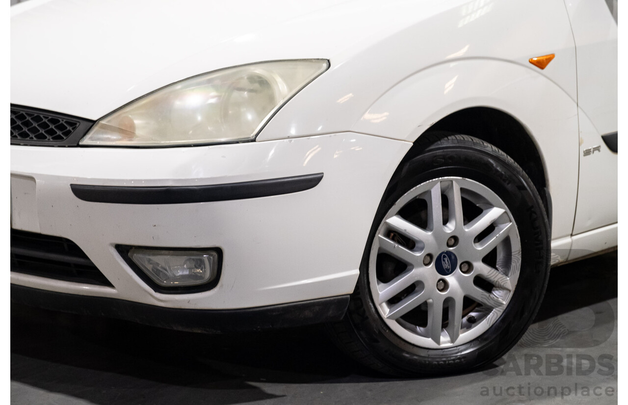 1/2004 Ford Focus SR LR 4d Sedan White 1.8L