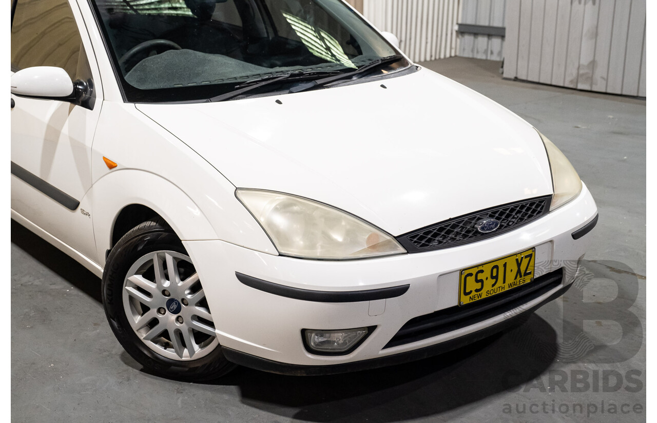1/2004 Ford Focus SR LR 4d Sedan White 1.8L