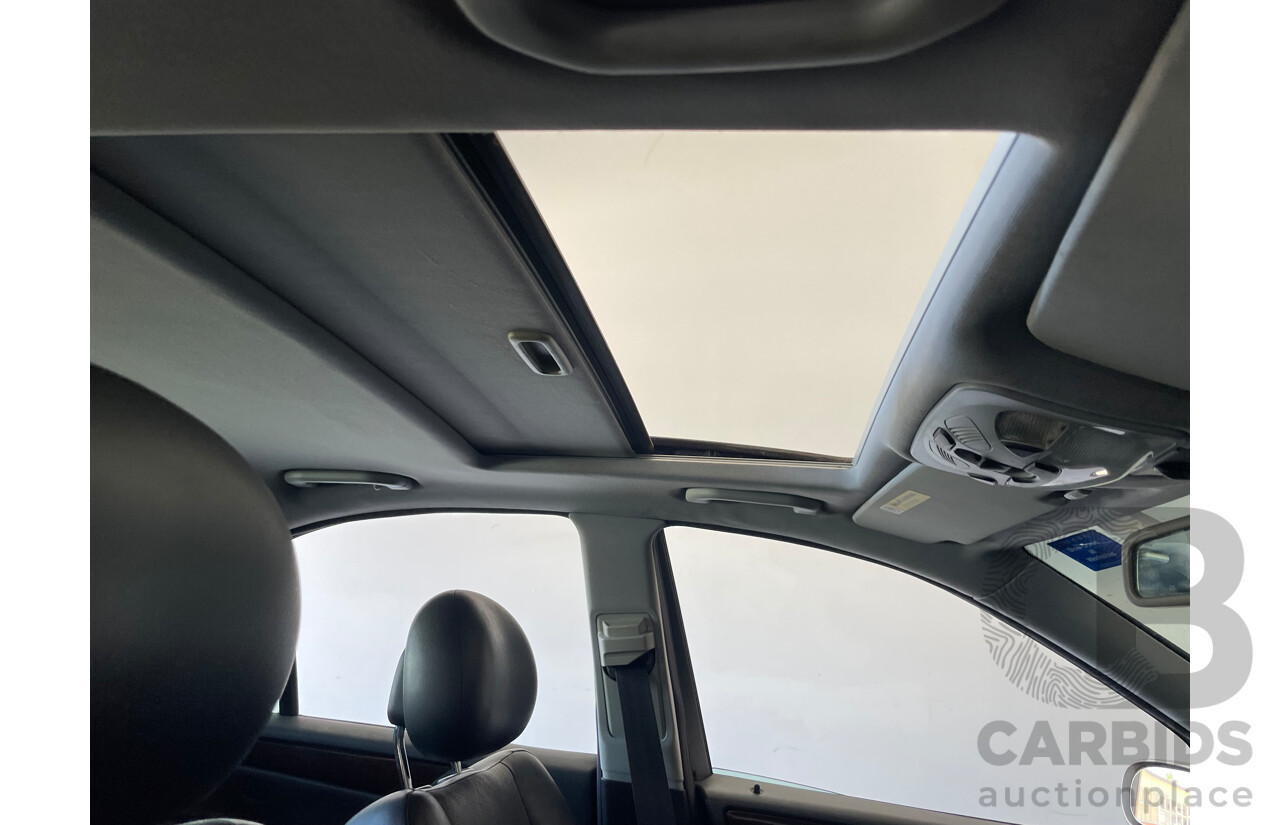 4/2004 Mercedes-Benz C200 Kompressor Elegance W203 4d Sedan Beige 1.8L