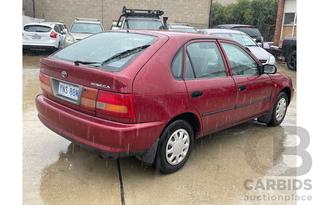 10/1996 Toyota Corolla CSi SECA AE101R 5d Liftback Maroon 1.6L