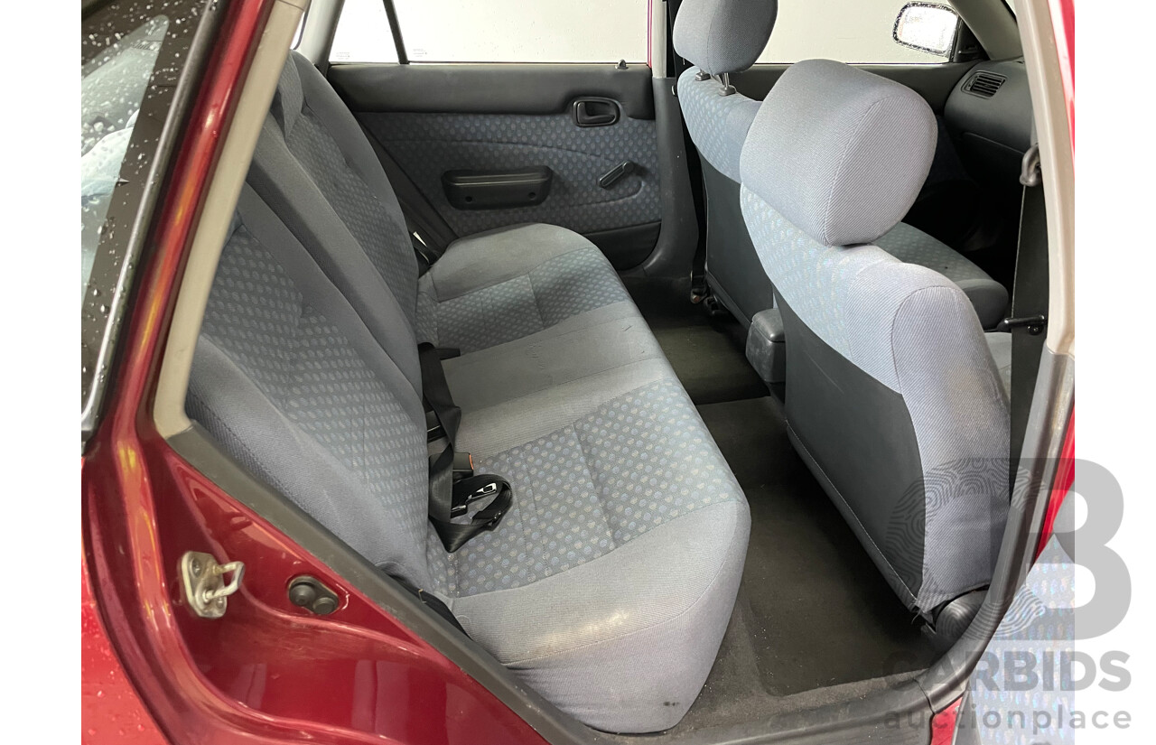 10/1996 Toyota Corolla CSi SECA AE101R 5d Liftback Maroon 1.6L