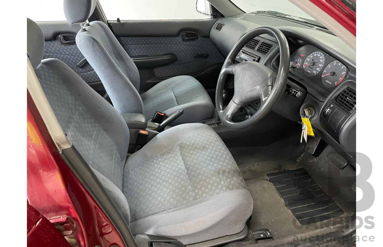 10/1996 Toyota Corolla CSi SECA AE101R 5d Liftback Maroon 1.6L