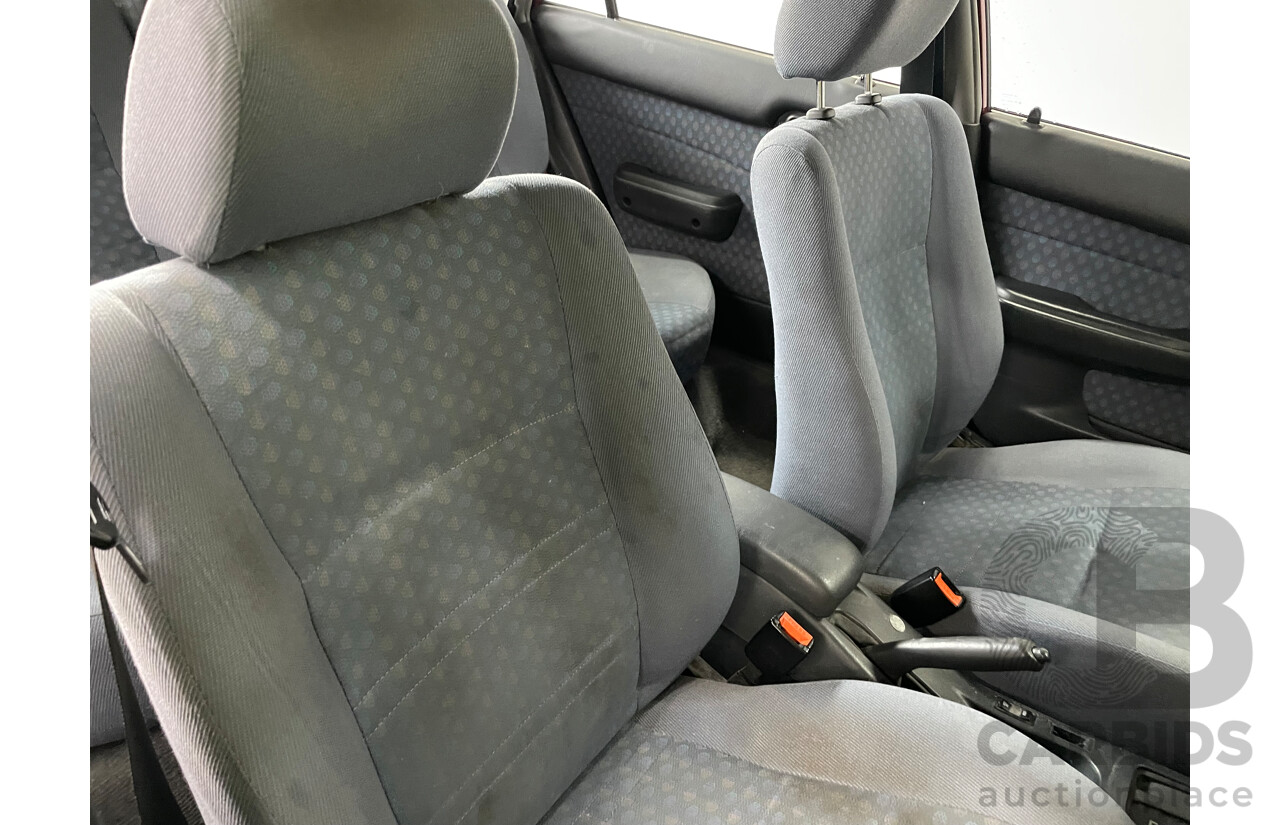 10/1996 Toyota Corolla CSi SECA AE101R 5d Liftback Maroon 1.6L