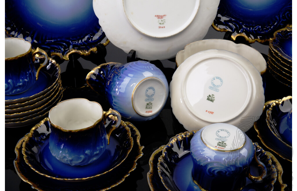 Antique French Limoges by M Redon 36 Piece Porcelain Tea Service with Textured Gilt Edge and Deep Blue Glaze, Marks to Rear