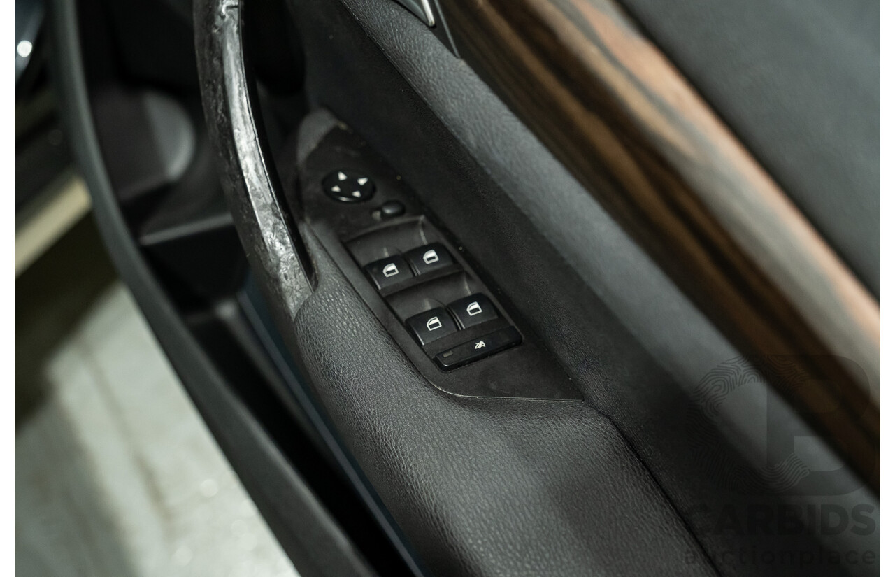 09/2013 BMW X1 Xdrive 28i (AWD) E84 MY13 4d Wagon Black Turbo 2.0L