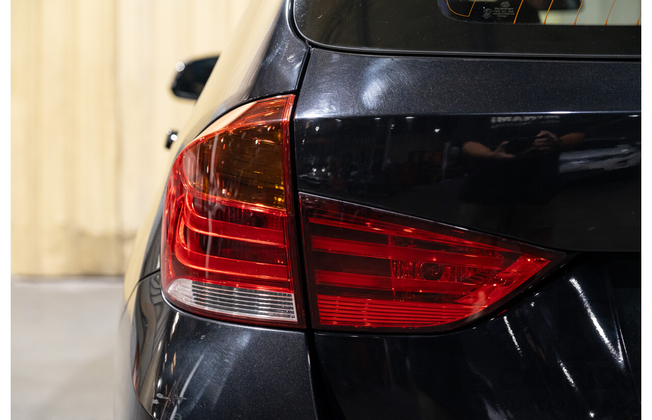 09/2013 BMW X1 Xdrive 28i (AWD) E84 MY13 4d Wagon Black Turbo 2.0L