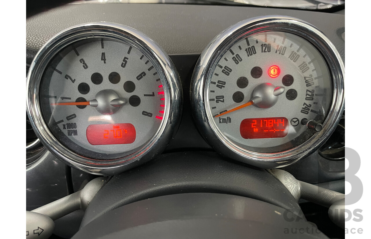 2/2006 Mini Cooper S R50 2d Cabriolet Cool Blue Metallic 1.6L