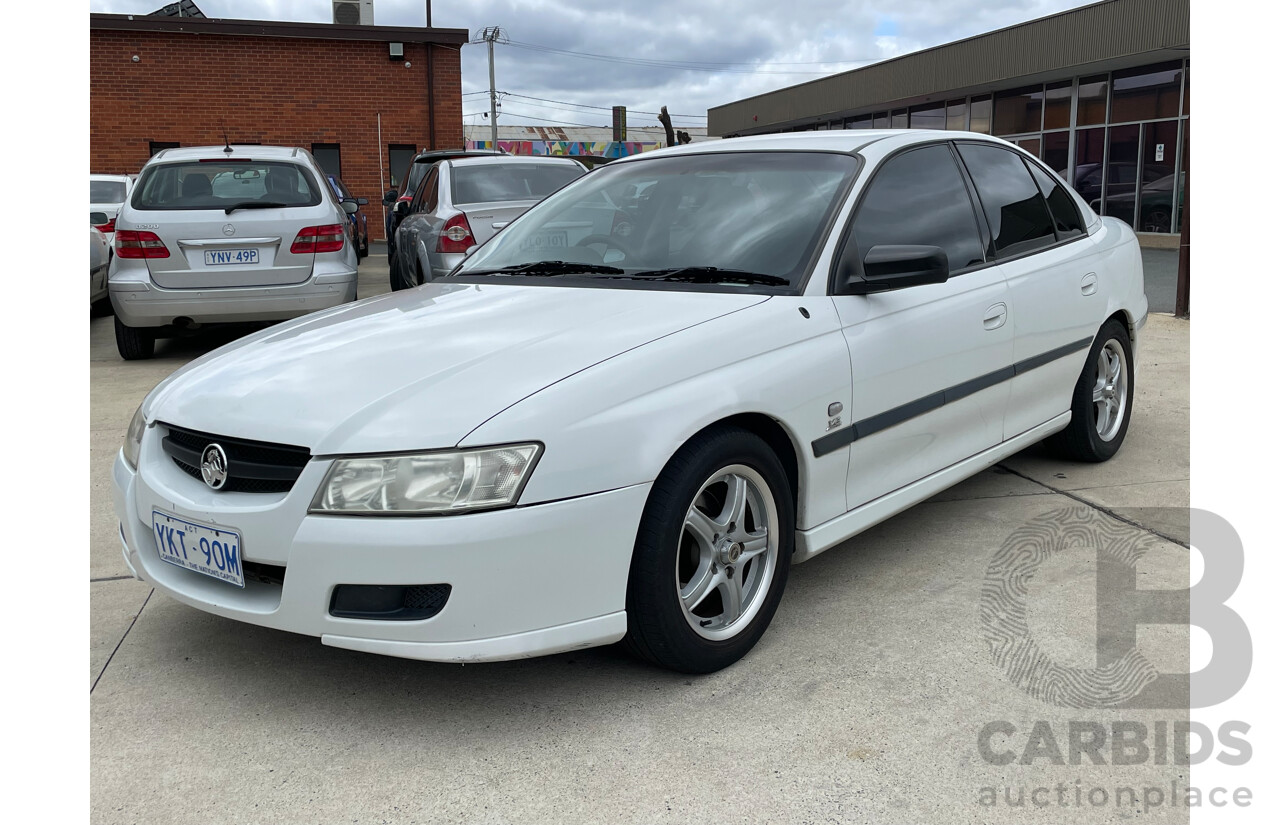 9/2004 Holden Commodore Executive VZ 4d Sedan White 3.6L