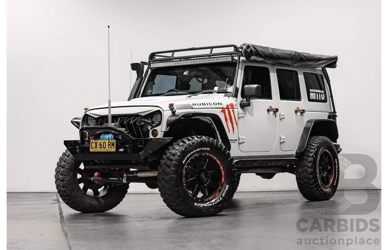 3/2011 Jeep Wrangler Unlimited Rubicon (4x4) JK MY11 4d Softtop White 3.8L - Modified