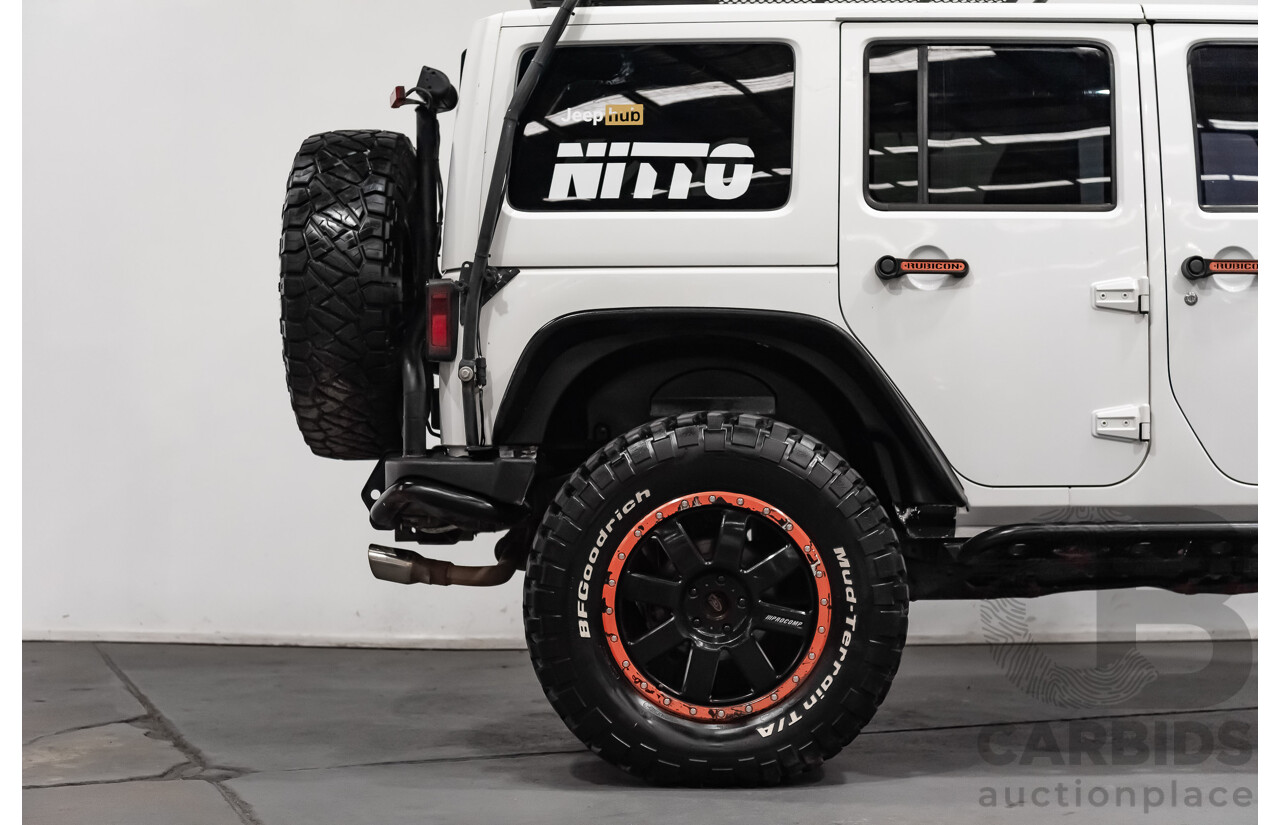 3/2011 Jeep Wrangler Unlimited Rubicon (4x4) JK MY11 4d Softtop White 3.8L - Modified