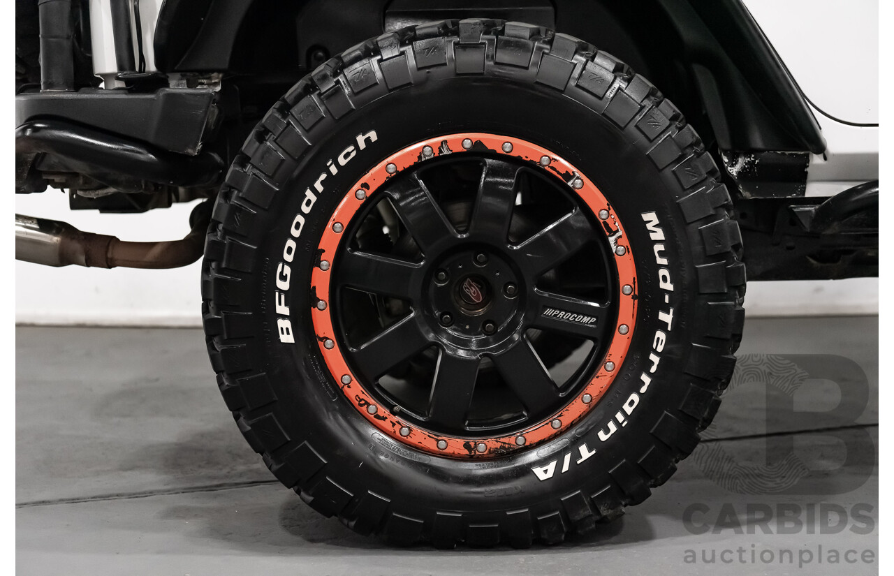 3/2011 Jeep Wrangler Unlimited Rubicon (4x4) JK MY11 4d Softtop White 3.8L - Modified