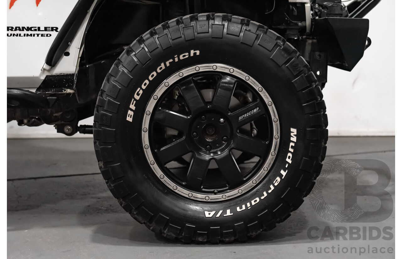 3/2011 Jeep Wrangler Unlimited Rubicon (4x4) JK MY11 4d Softtop White 3.8L - Modified