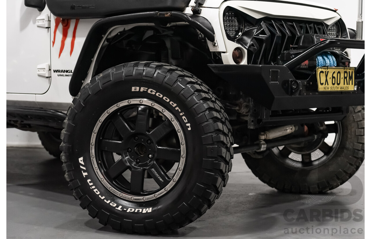 3/2011 Jeep Wrangler Unlimited Rubicon (4x4) JK MY11 4d Softtop White 3.8L - Modified