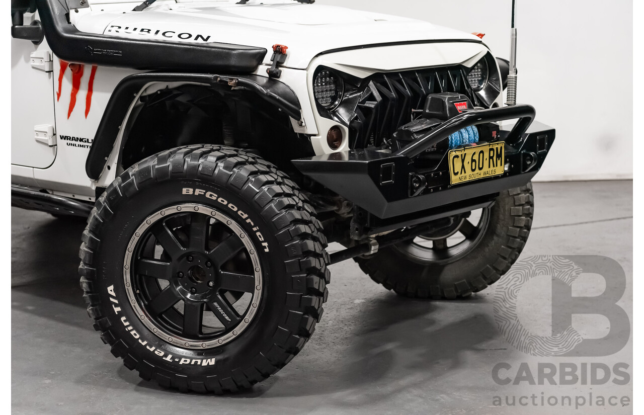 3/2011 Jeep Wrangler Unlimited Rubicon (4x4) JK MY11 4d Softtop White 3.8L - Modified