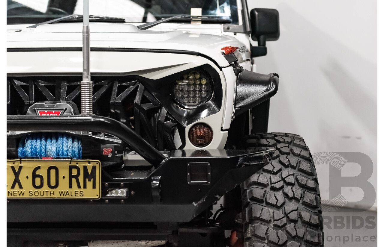 3/2011 Jeep Wrangler Unlimited Rubicon (4x4) JK MY11 4d Softtop White 3.8L - Modified