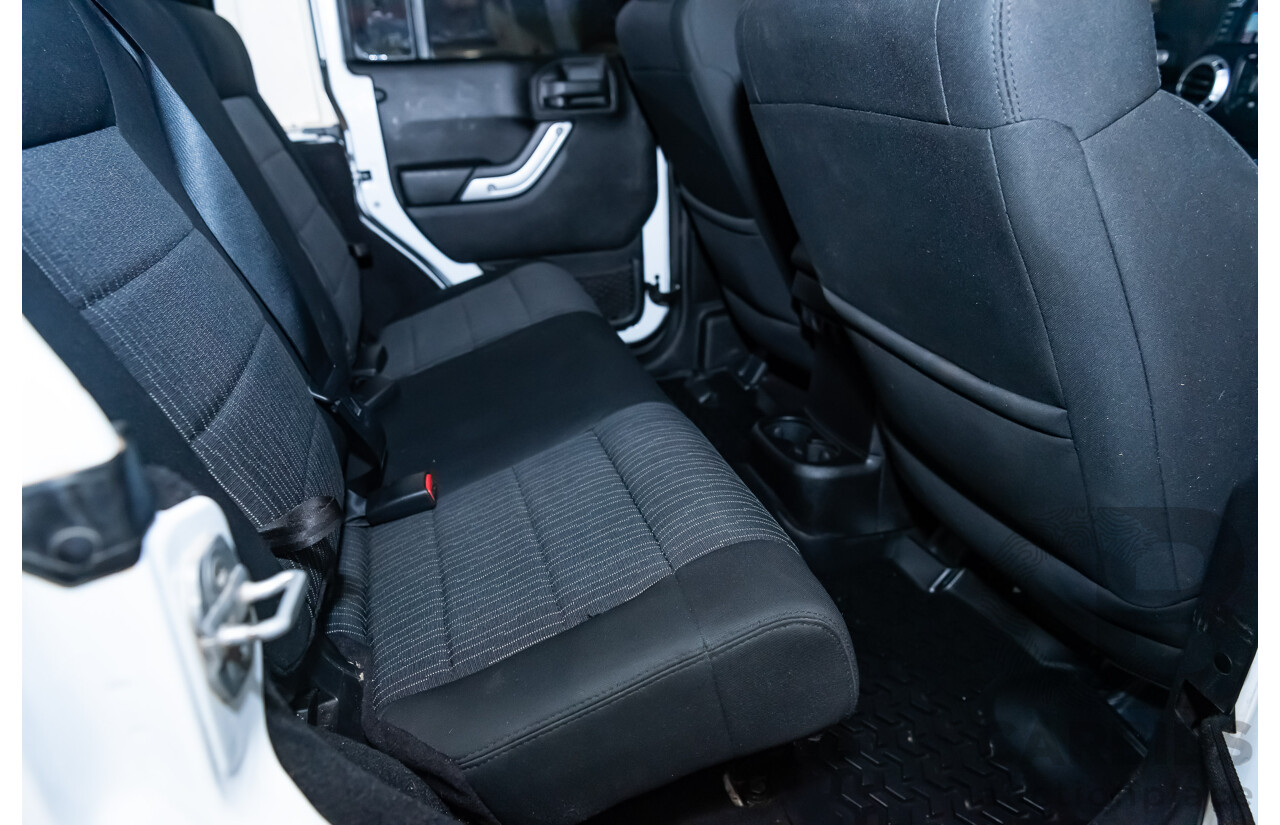 3/2011 Jeep Wrangler Unlimited Rubicon (4x4) JK MY11 4d Softtop White 3.8L - Modified