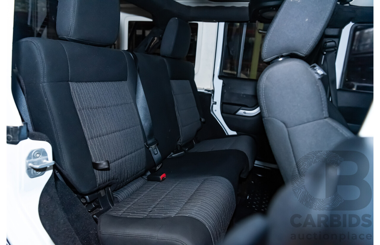 3/2011 Jeep Wrangler Unlimited Rubicon (4x4) JK MY11 4d Softtop White 3.8L - Modified