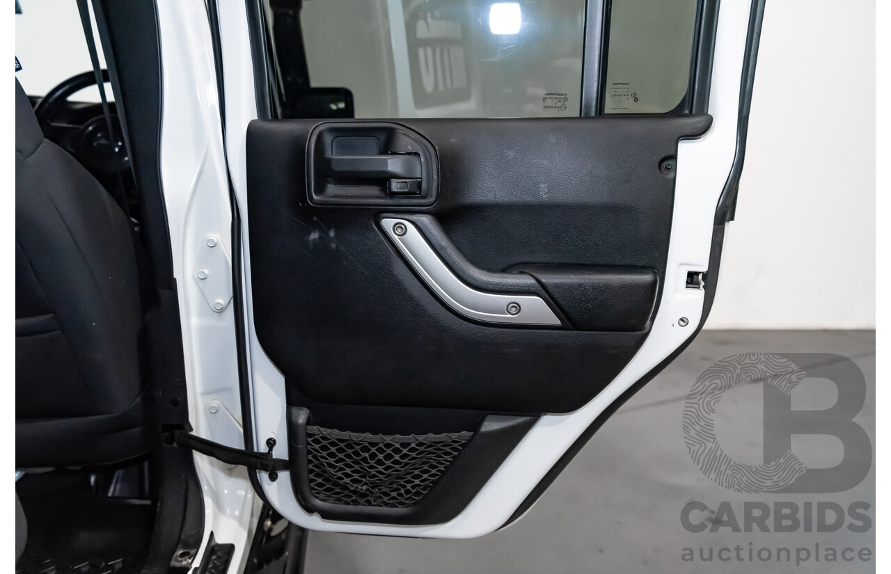 3/2011 Jeep Wrangler Unlimited Rubicon (4x4) JK MY11 4d Softtop White 3.8L - Modified