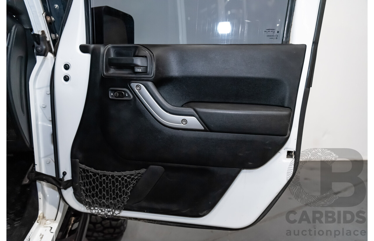 3/2011 Jeep Wrangler Unlimited Rubicon (4x4) JK MY11 4d Softtop White 3.8L - Modified