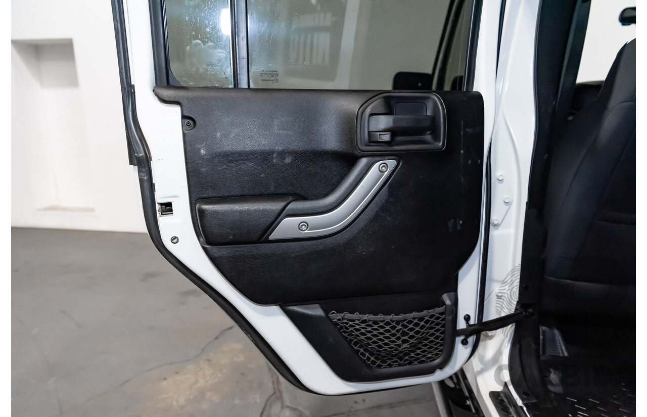 3/2011 Jeep Wrangler Unlimited Rubicon (4x4) JK MY11 4d Softtop White 3.8L - Modified