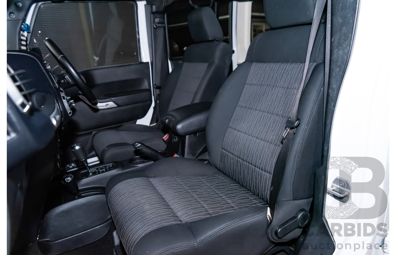 3/2011 Jeep Wrangler Unlimited Rubicon (4x4) JK MY11 4d Softtop White 3.8L - Modified