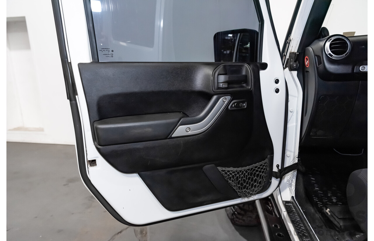 3/2011 Jeep Wrangler Unlimited Rubicon (4x4) JK MY11 4d Softtop White 3.8L - Modified