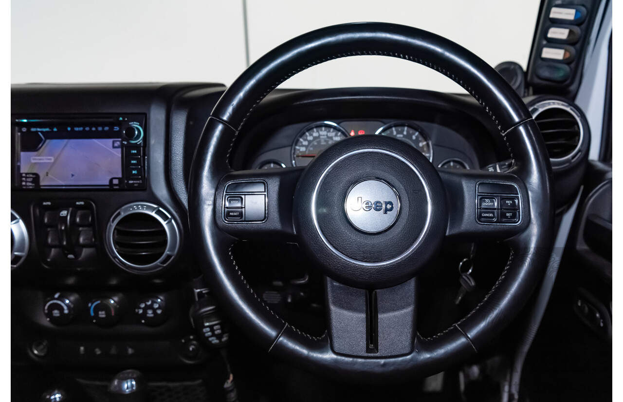 3/2011 Jeep Wrangler Unlimited Rubicon (4x4) JK MY11 4d Softtop White 3.8L - Modified