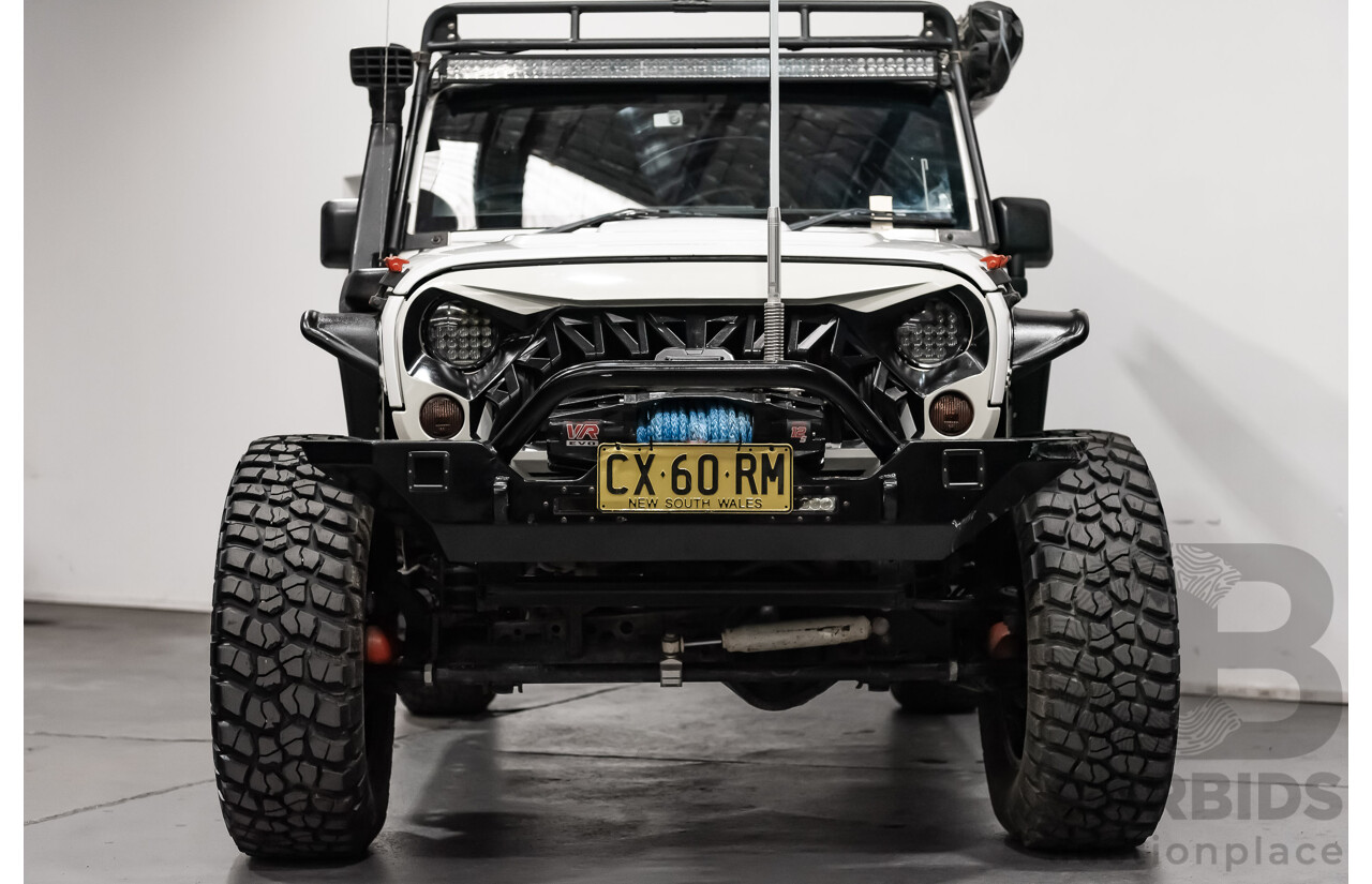 3/2011 Jeep Wrangler Unlimited Rubicon (4x4) JK MY11 4d Softtop White 3.8L - Modified