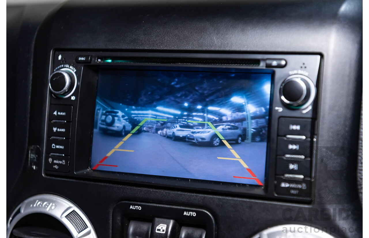 3/2011 Jeep Wrangler Unlimited Rubicon (4x4) JK MY11 4d Softtop White 3.8L - Modified