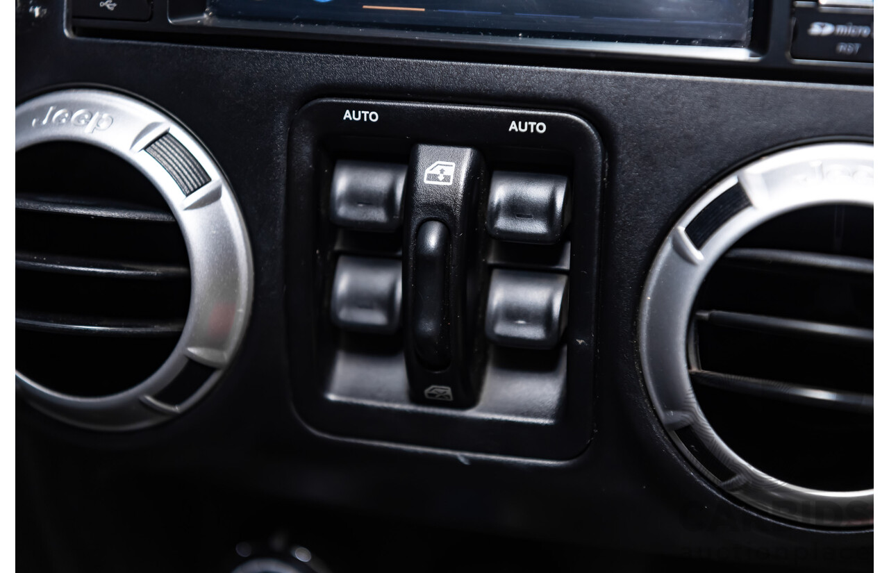 3/2011 Jeep Wrangler Unlimited Rubicon (4x4) JK MY11 4d Softtop White 3.8L - Modified