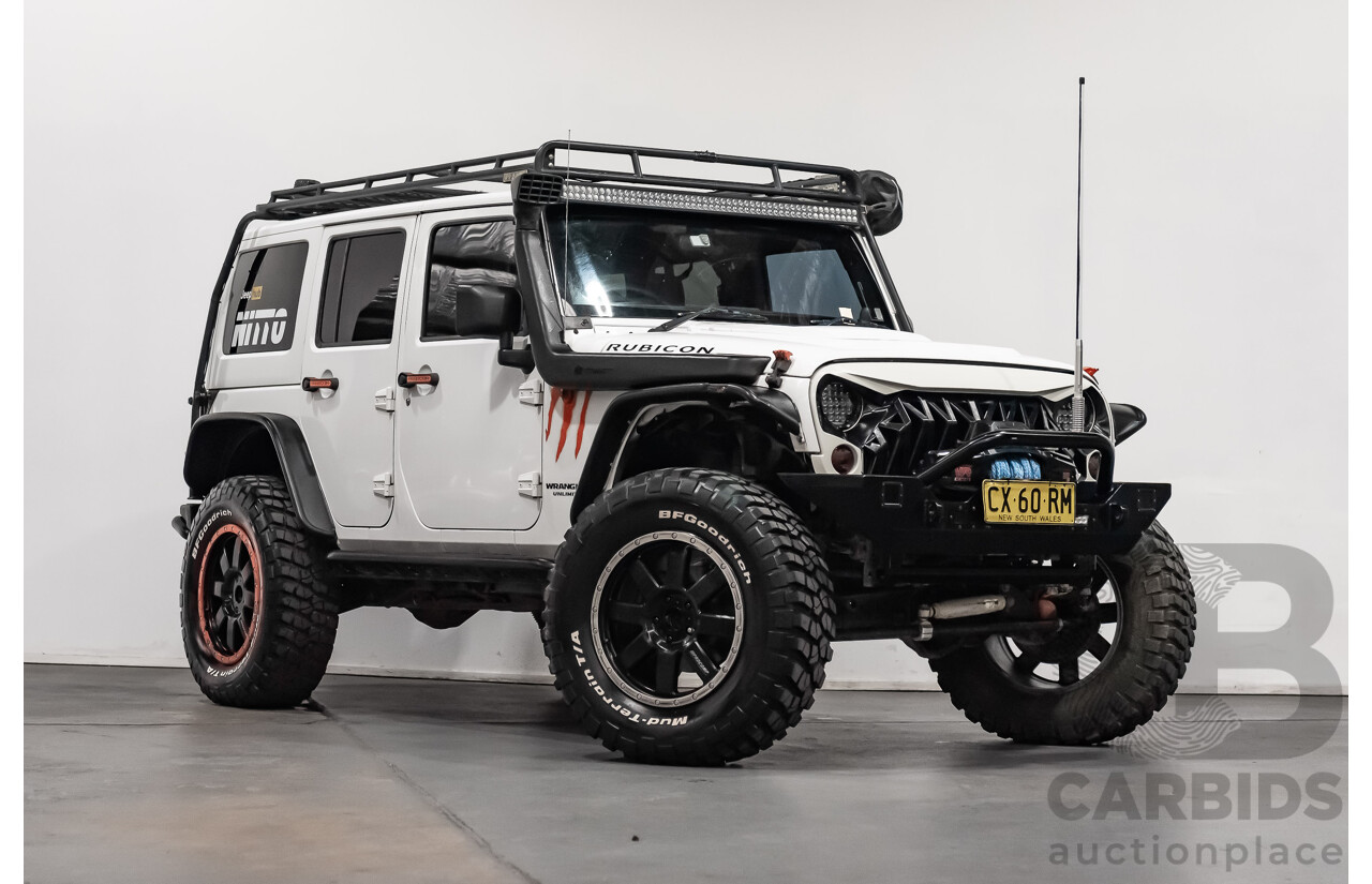 3/2011 Jeep Wrangler Unlimited Rubicon (4x4) JK MY11 4d Softtop White 3.8L - Modified