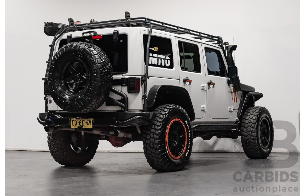 3/2011 Jeep Wrangler Unlimited Rubicon (4x4) JK MY11 4d Softtop White 3.8L - Modified